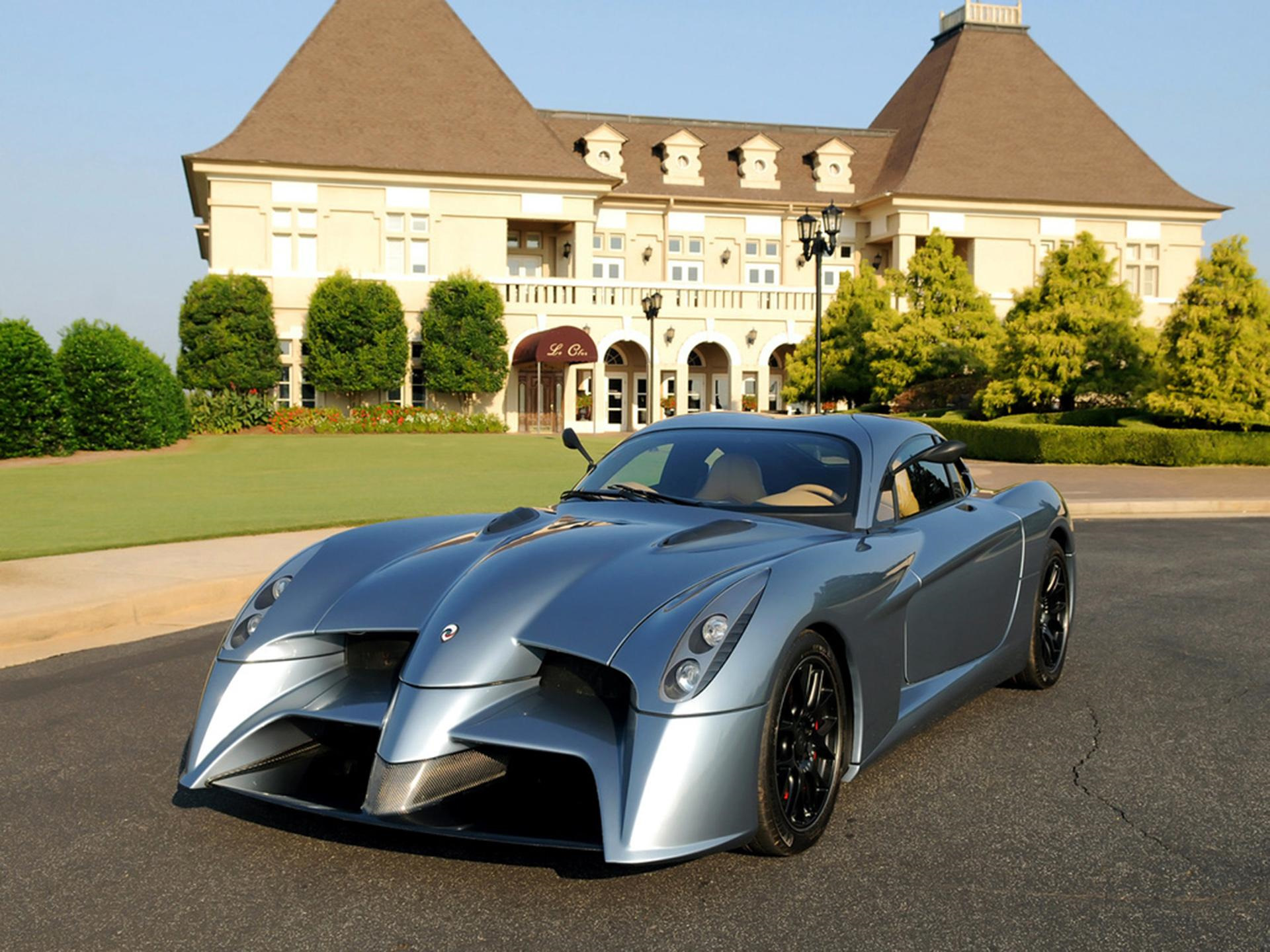 Самые крутые марки машин. Panoz Abruzzi. 2011 Panoz Abruzzi. Panoz Abruzzi Lemans 2011. Panoz суперкар.