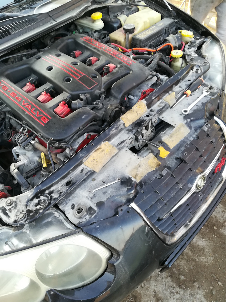 Как заменить лампу ближнего света? — Chrysler 300M, 3,5 л., 1999 года ...