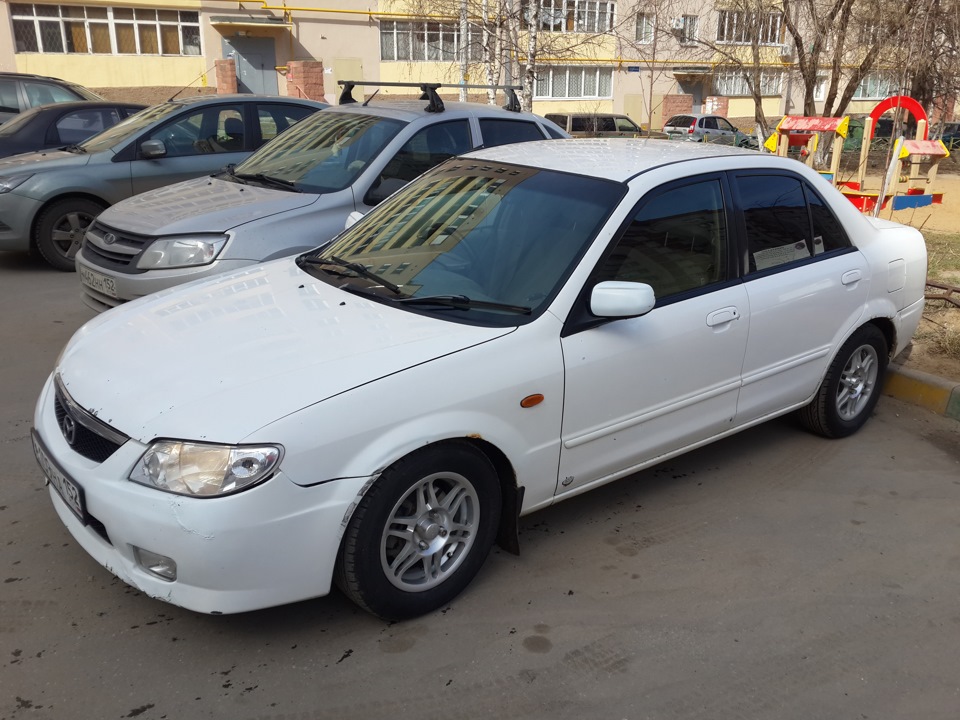 Мазда фамилия размер. Мазда Фэмили 2002. Мазда фамилия 2002 1.5. Mazda familia 5. 185/65/15 На Мазда фамилия.