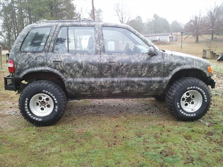 Фото в бортжурнале KIA Sportage (1G)