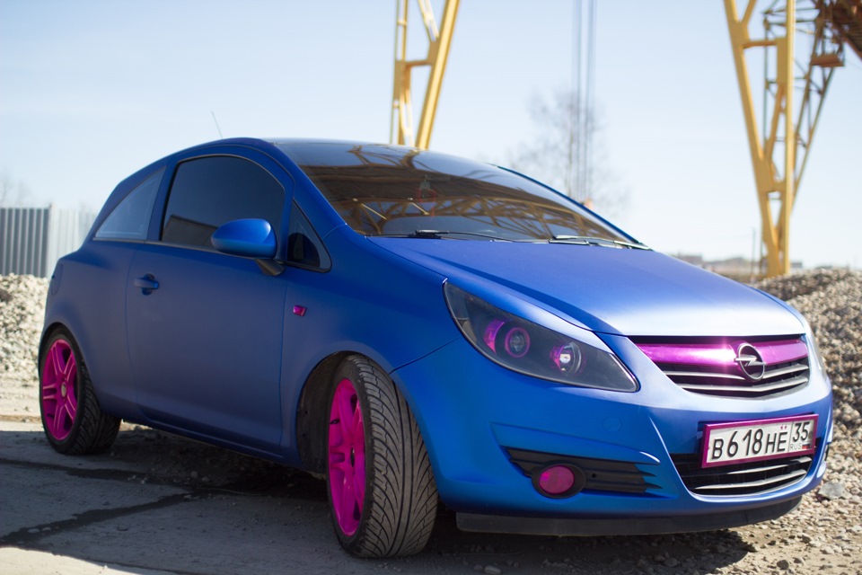 Opel петербург. Опель Корса фиолетовая. Opel Astra g фиолетовый. Опель синий. Опель синего цвета.