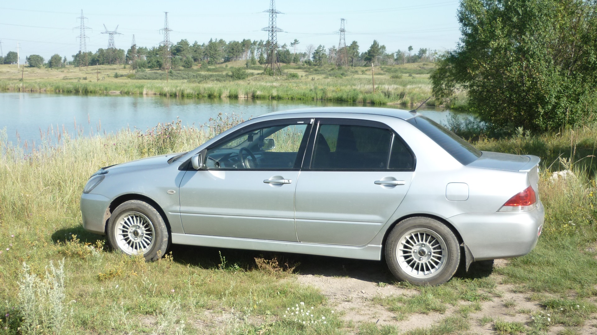 Mitsubishi lancer 2004 год