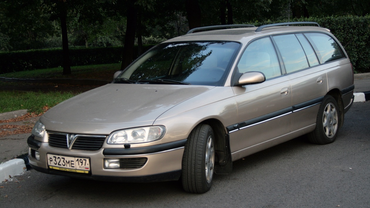 Омега караван. Опель Омега Караван 1998. Opel Omega Caravan 2003. Опель Омега Караван универсал 1998. Opel Omega b Caravan.