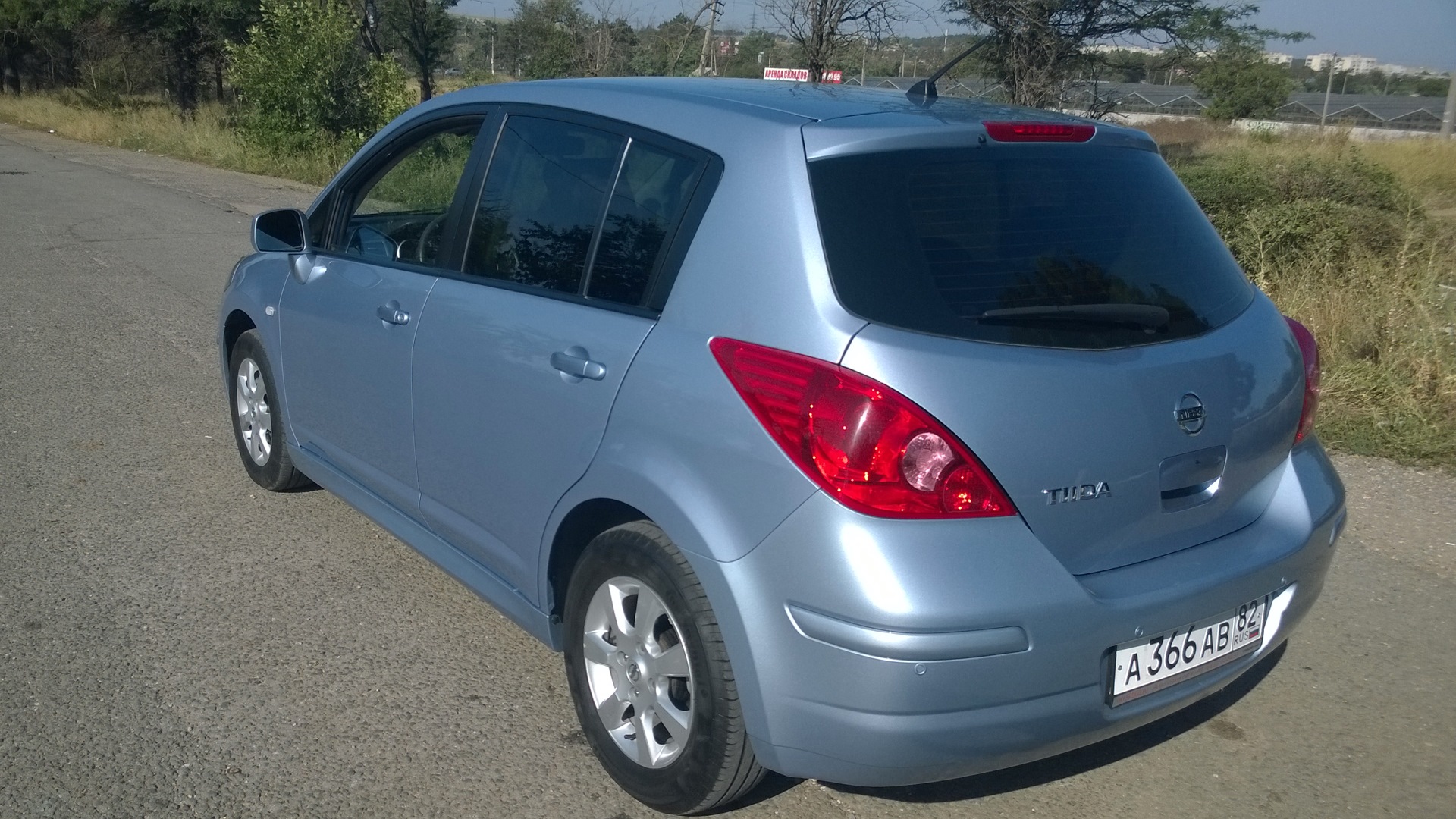 Nissan Tiida голубая 2010