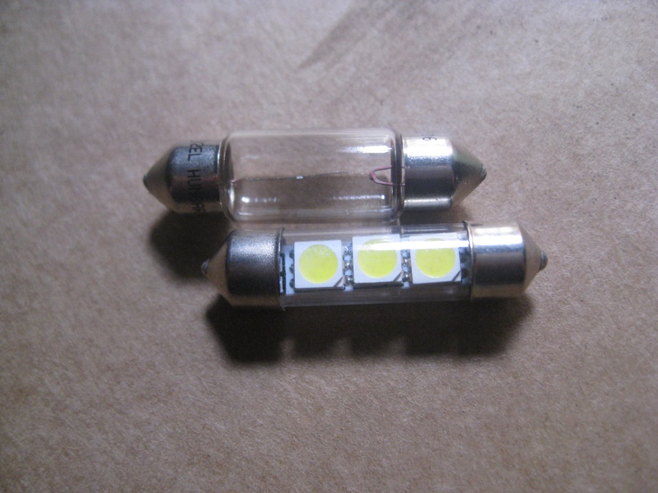 Лампочка е34. Лампочки на номерной знак БМВ х5 е70. Лампа подсветки номера БМВ 520. Лампа подсветки номера на БМВ е34. Цоколь лампы подсветки номера БМВ х5.