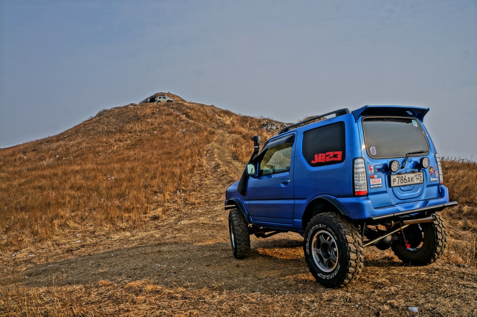 Купить джимни в приморском крае. Suzuki Jimny 2002. Лифтованный Suzuki Jimny. Сузуки Джимни 0.7 турбо. Сузуки Джимни пикап.