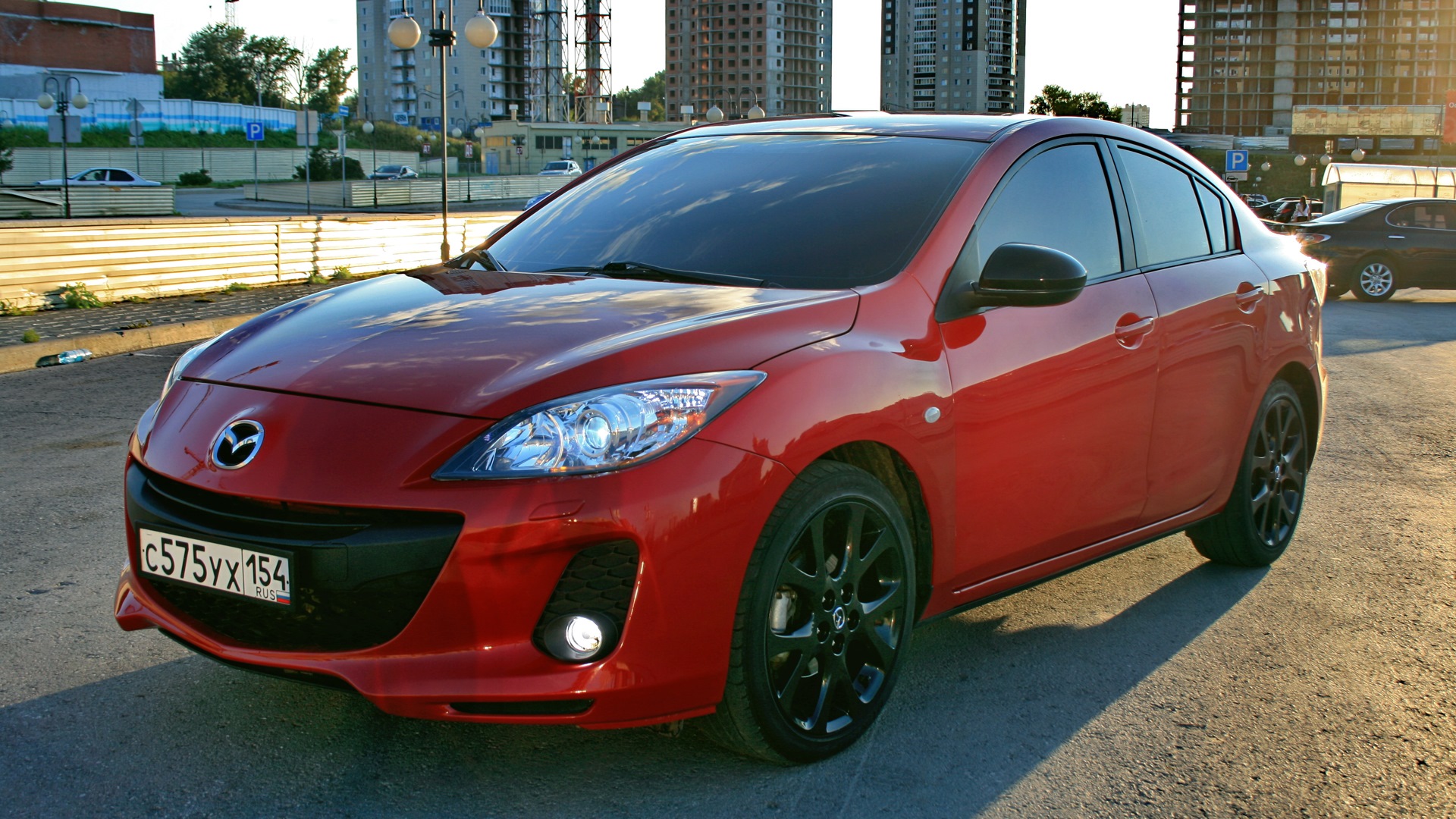 Mazda 3 колеса. Мазда 3 красная. Mazda 3 2011 красная. Мазда 3 BL красная. Красная Мазда 3 с черными дисками.