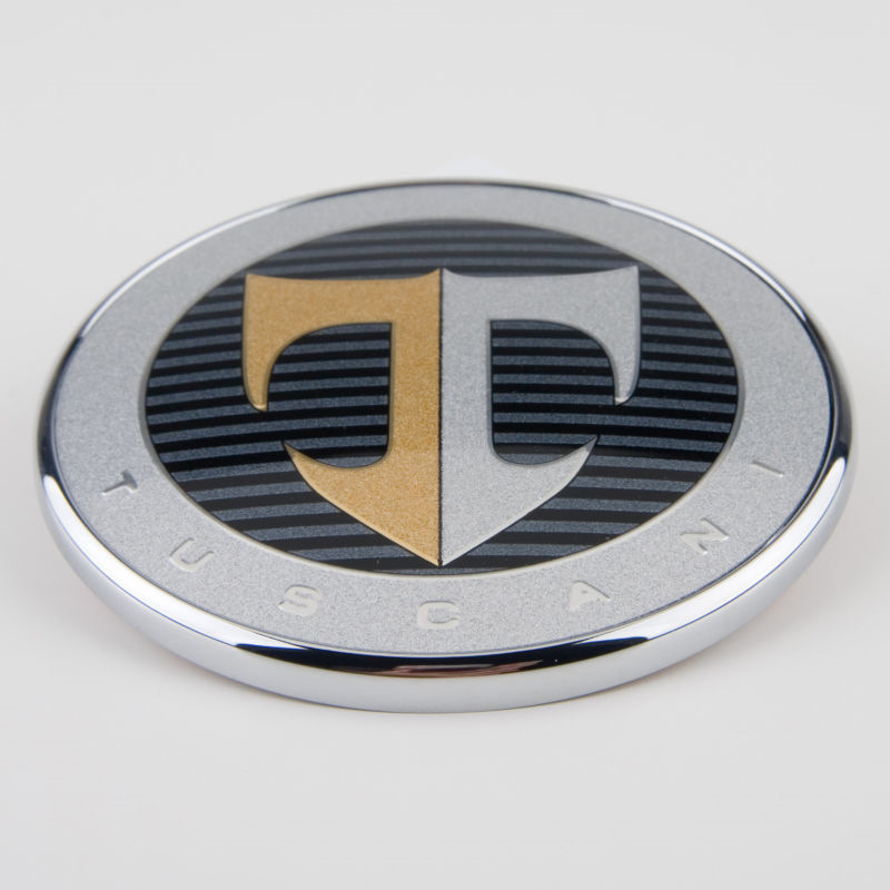 Значок буква т. Hyundai Tuscani эмблема. Hyundai Tiburon значок. Hyundai Tiburon 2008 с т логотипом. Хендай Тибурон значок.