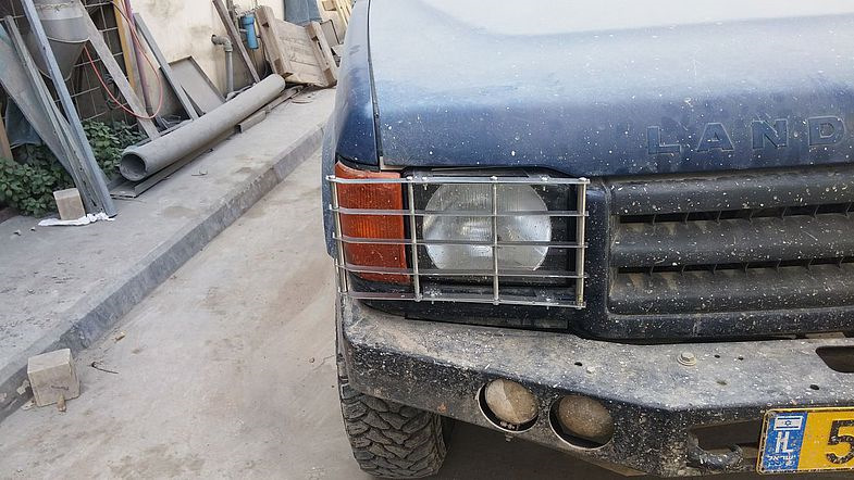 Защита фар — Land Rover Discovery II, 2,5 л, 2001 года | тюнинг | DRIVE2