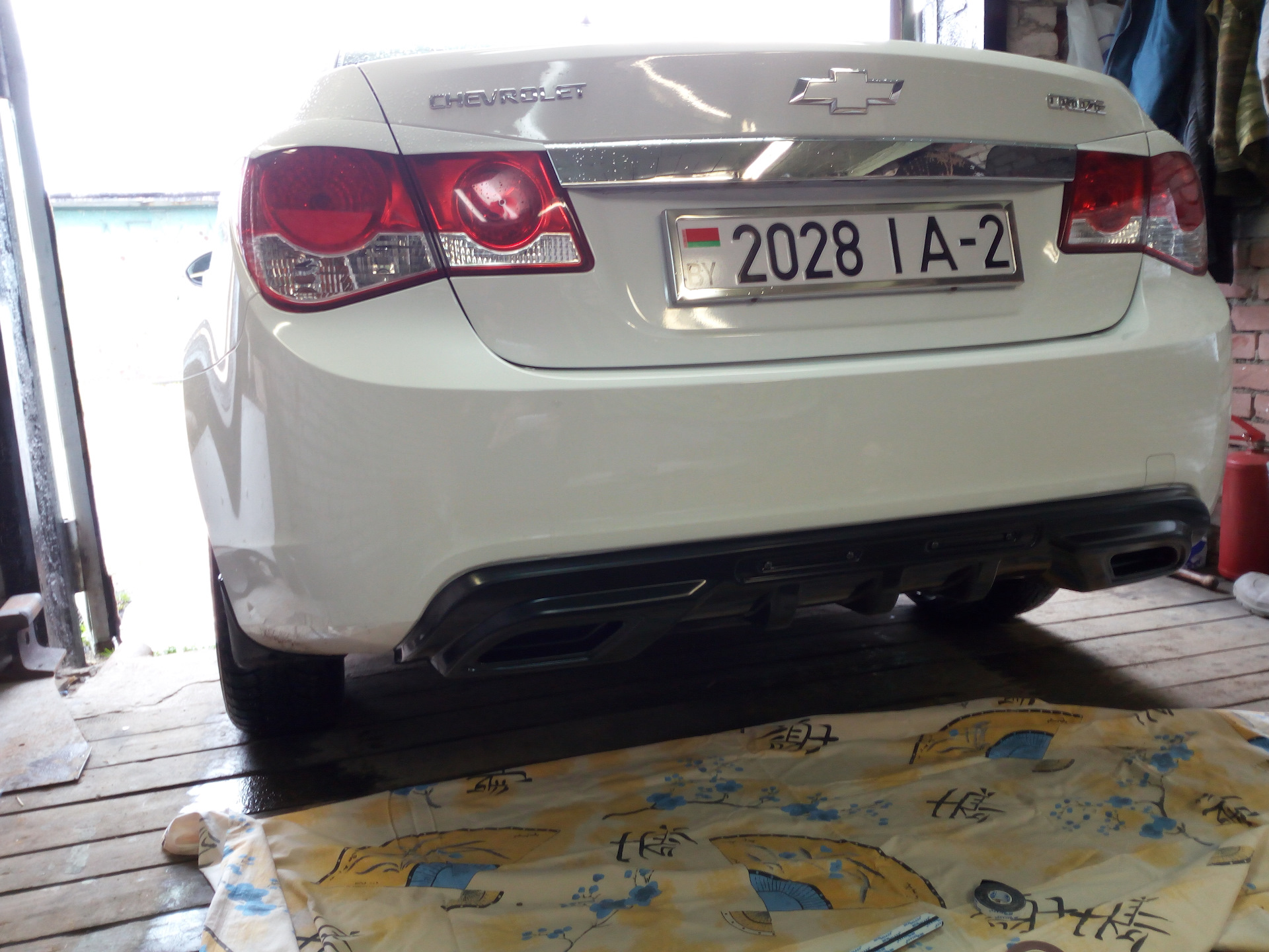 Chevrolet cruze rear bumper diffusor. Диффузор заднего бампера круз. Диффузор шевроле круз. Диффузор заднего бампера круз. Задний диффузор шевроле круз.