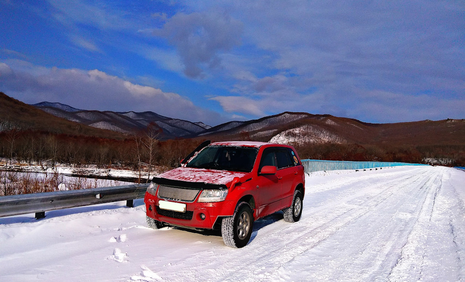 Сузуки владивосток. Suzuki Escudo оранжевый. Машины Сузуки Владивосток. Сузуки эскудо и вулканы Камчатки.