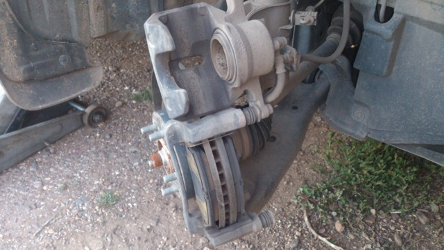 Суппорт в откинутом состоянии. — Mazda CX-5 (1G)