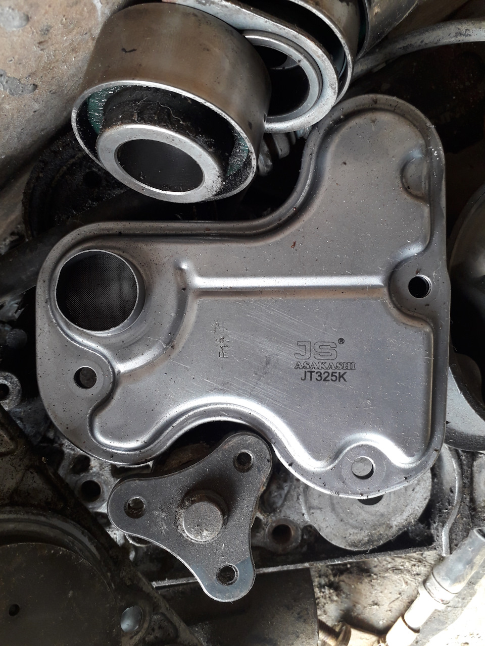 фильтр АКПП был JT325K — Mazda 323 V. Запчасти на фото: JT325K