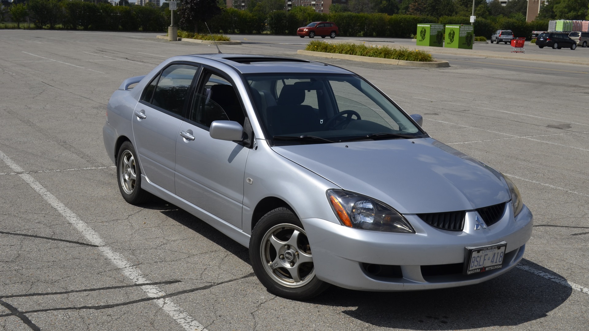 Mitsubishi lancer 2004 год