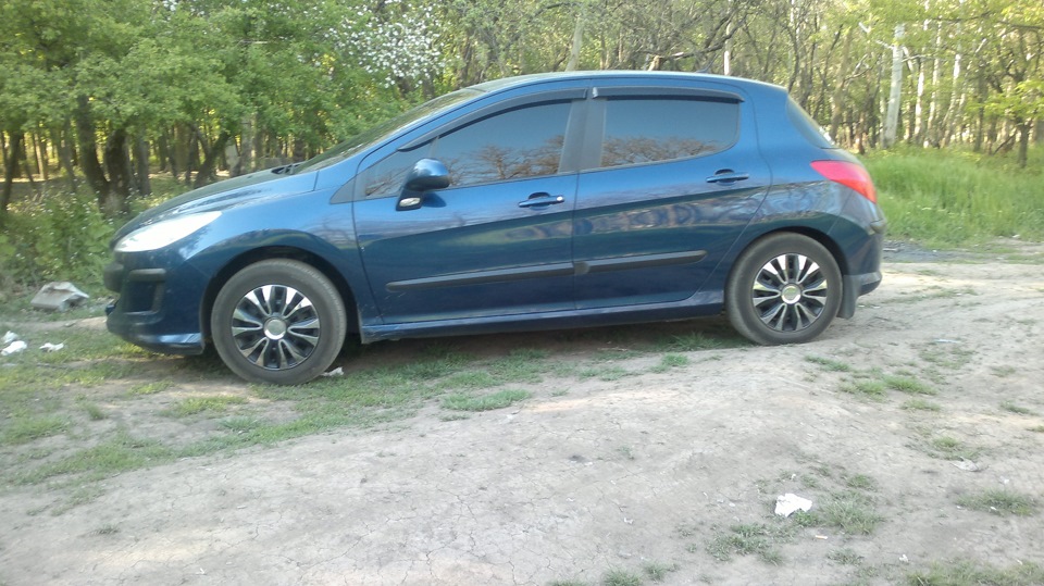 Новые колпаки! — Peugeot 308 (1G), 1,6 л, 2008 года | аксессуары | DRIVE2