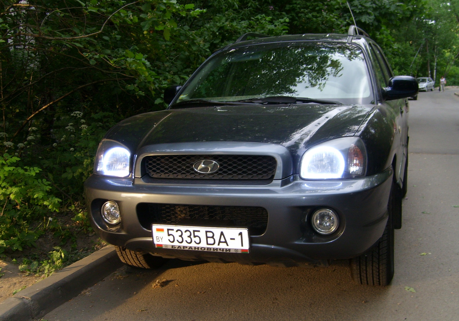 Сант фар. Hyundai Santa Fe Classic фары. Санта Фе 2003 фары. Санта Фе 2004 ПТФ. Тюнинговые фары Хендай Санта Фе 1 поколения.