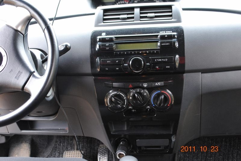 окраска некоторых пластиковых деталей салона — Daihatsu Materia, 1,5 л ...