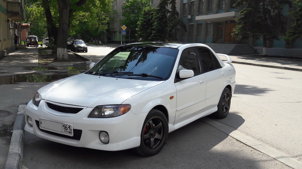 Машина фамилия. Mazda familia 2000 4wd. Mazda familia 4wd. Mazda familia 4 ВД. Mazda familia bj 4wd.