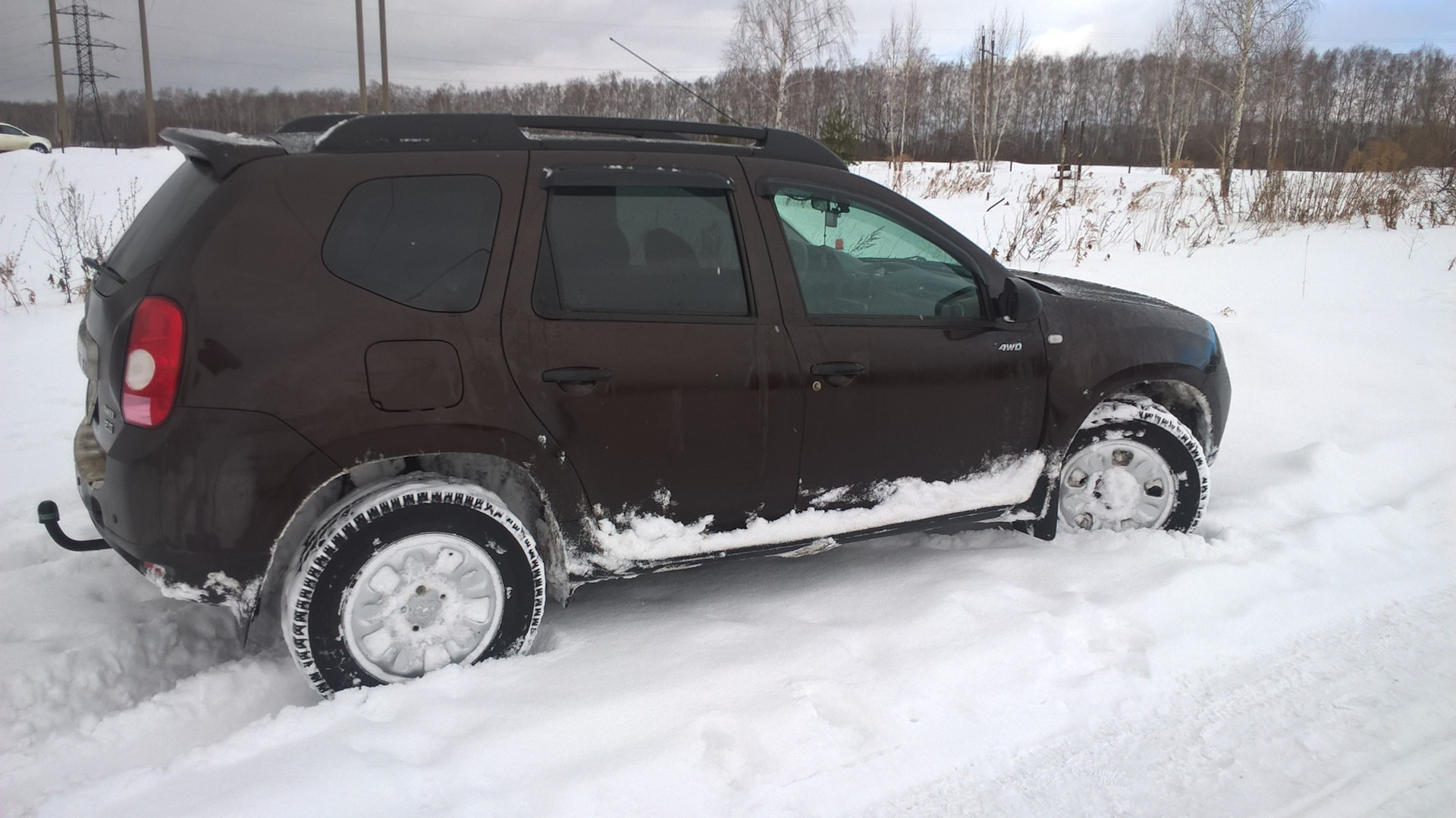 Renault Duster (1G) 2.0 бензиновый 2014 | 4*4 Темный каштан на DRIVE2