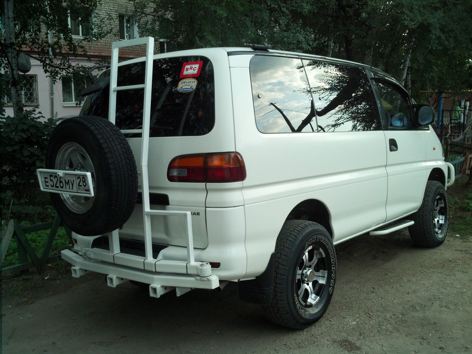 Л 400. Тонировка Делика. Mitsubishi Delica спереди. Делика Эволюшн. Митсубиси Делика Эволюшн.