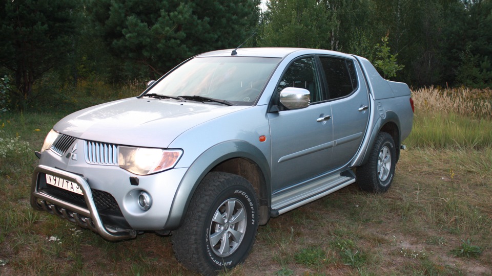 Л200 2011 год. Mitsubishi l200 2009. Митсубиси Эль 200. Мицубиси л200 2009. Mitsubishi l200 серебристый.