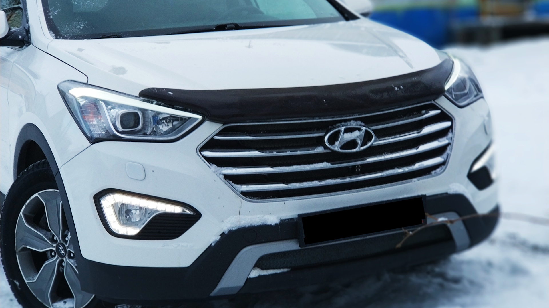 Отзыв хендай санта фе дизель. Hyundai Grand Santa Fe. Хендэ Санта Фе 2014. Grand Santa Fe хром бампера. Санта Фе 2014 отзывы.