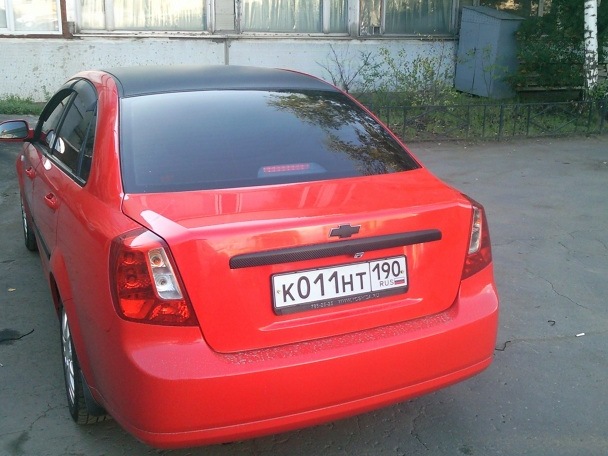 Chevrolet Lacetti красный с черной крышей