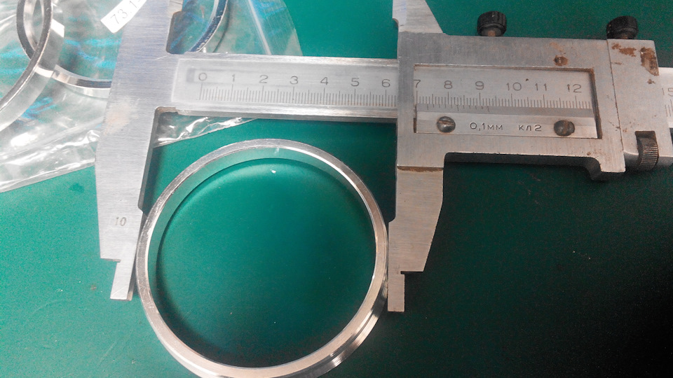 Центровочные кольца + новые гайки + клипсы — Nissan Almera II (N16), 1 ...