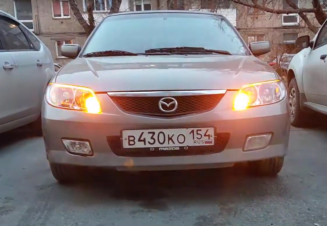 Скрытая функция поворотников-аварийки — Mazda 323 VI, 1,6 л, 2001 года |  наблюдение | DRIVE2