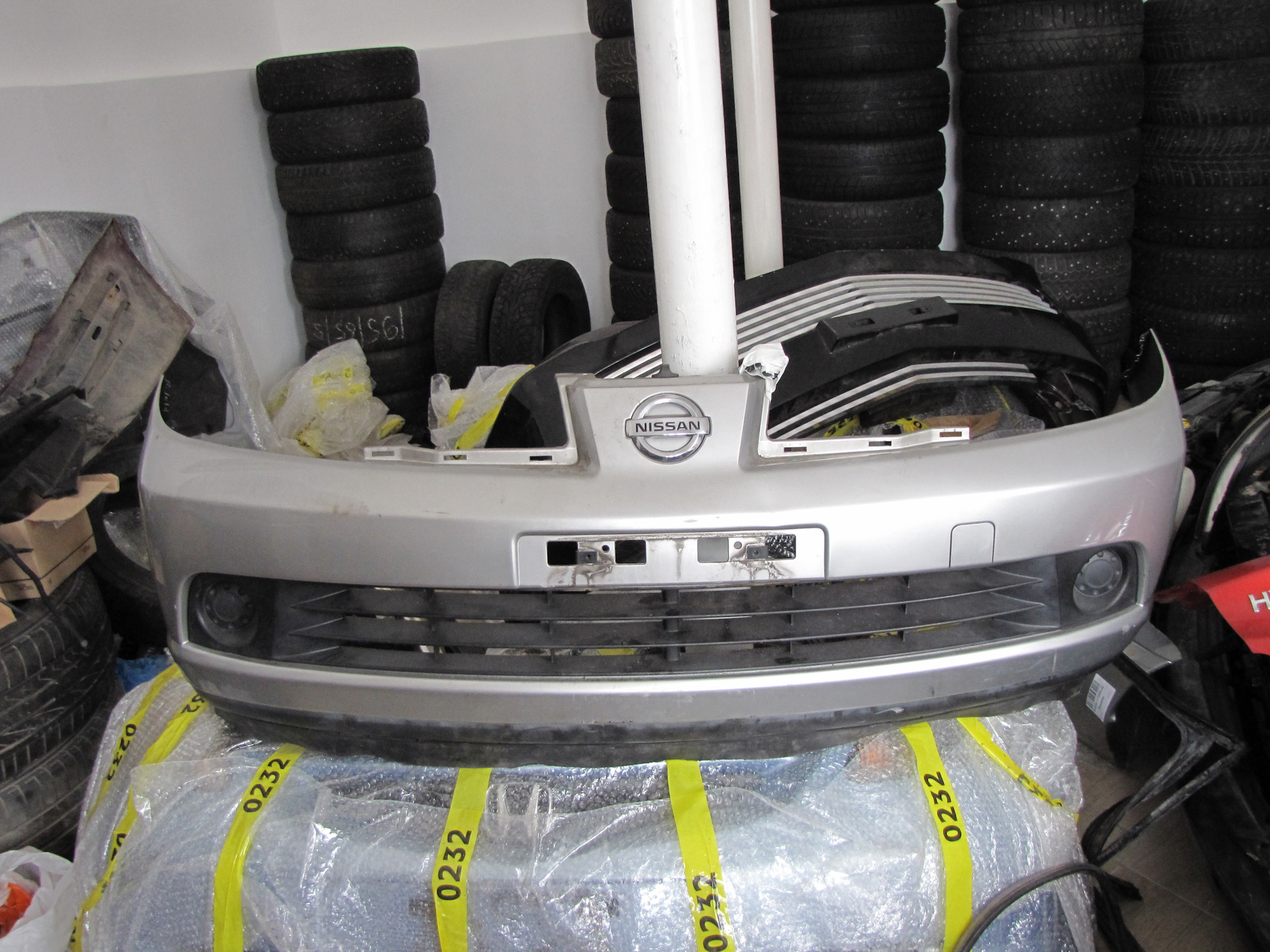 Купить Бампер Ниссан Тиида С 11