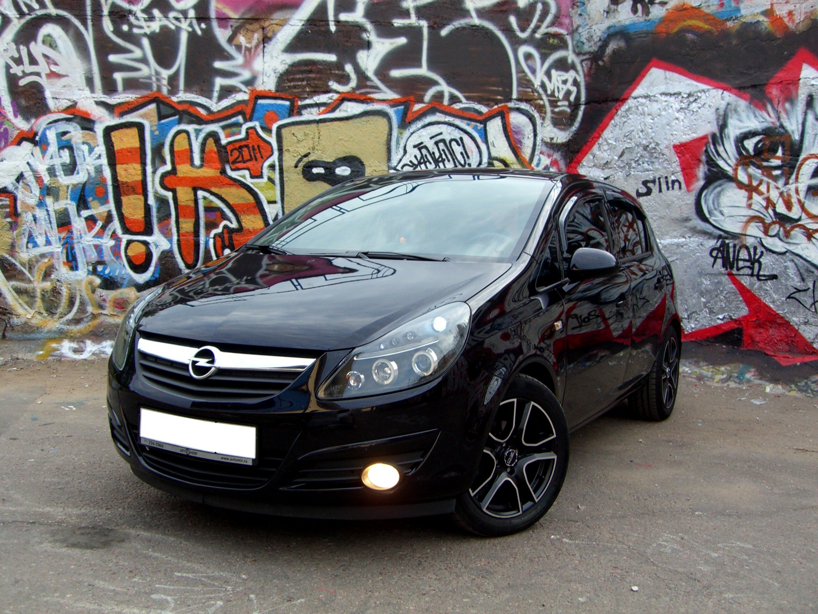 Фары opel corsa d. Opel Corsa d Tuning черная. Опель Корса д 2007 черная. Opel Corsa d черная. Черная оптика Opel Corsa d.