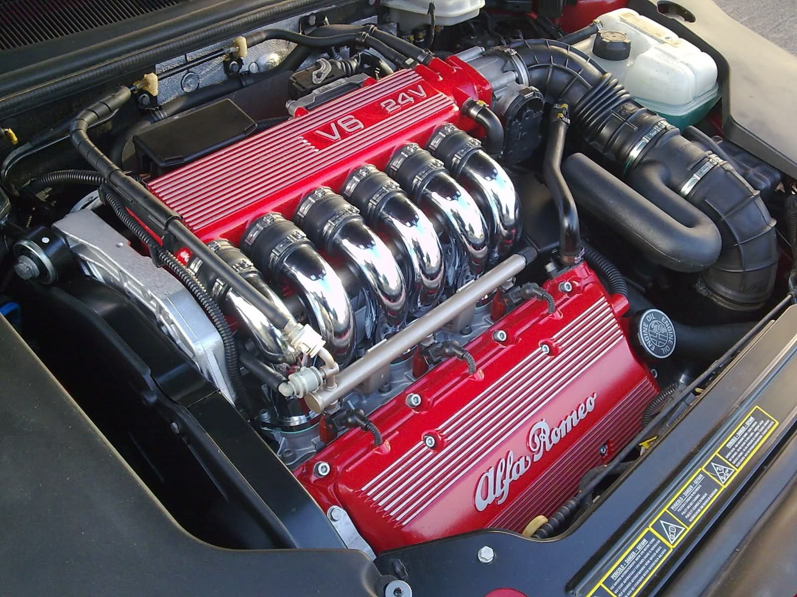 Моторы alfa. Alfa Romeo v6 Busso. Двигатель Альфа Ромео 2.5 v6. Двигатель Альфа Ромео v6. Мотор Альфа Ромео 3.2.