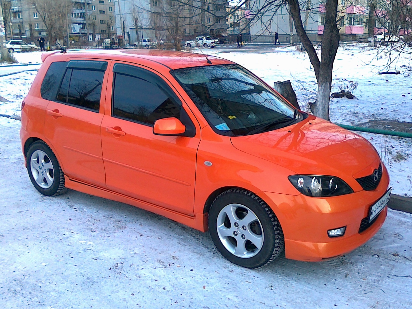 Купить демио новосибирск. Mazda Demio 1.5. Mazda Demio 2002. Mazda Demio 2003 Sport Orange. Mazda Demio 2002 1.5 Sport.