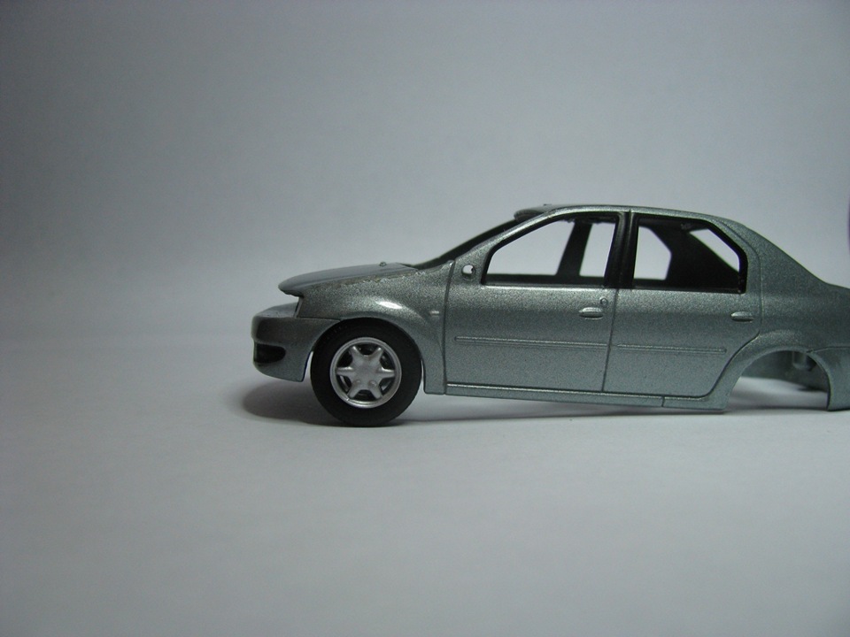 моделька логана. моделька логана. моделька логана. модель renault logan игрушка черная. логан 1 prestige.