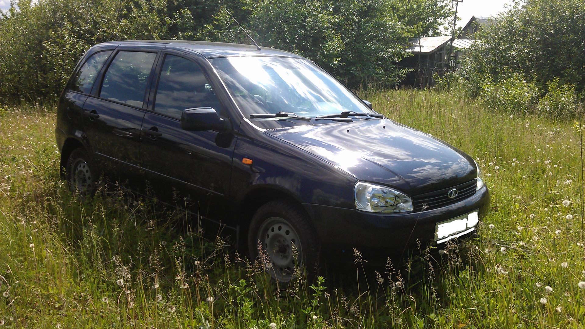 Lada Калина универсал 1.6 бензиновый 2012 | черный металлик на DRIVE2