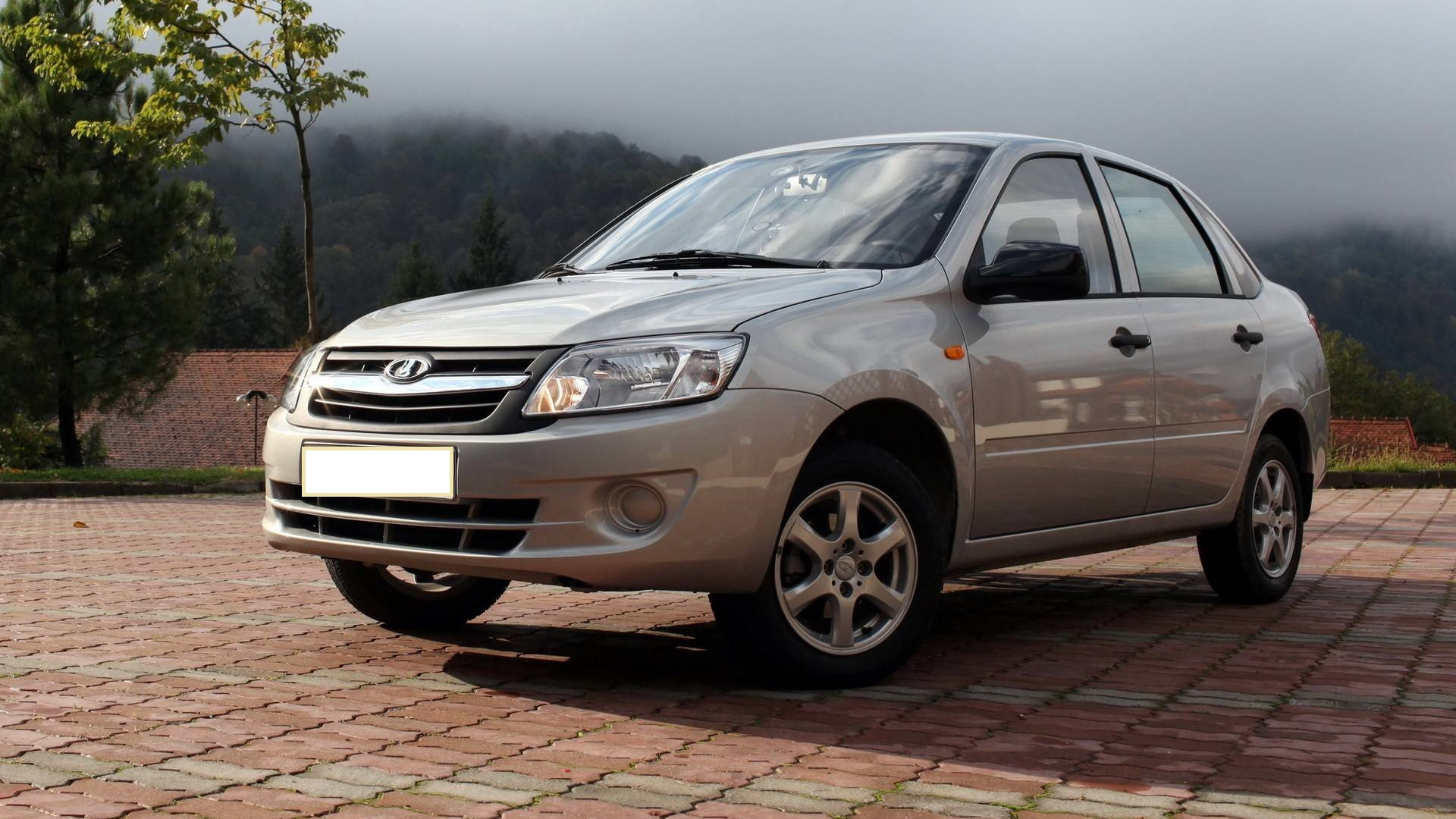 Lada Гранта 1.6 бензиновый 2012 | золото на DRIVE2