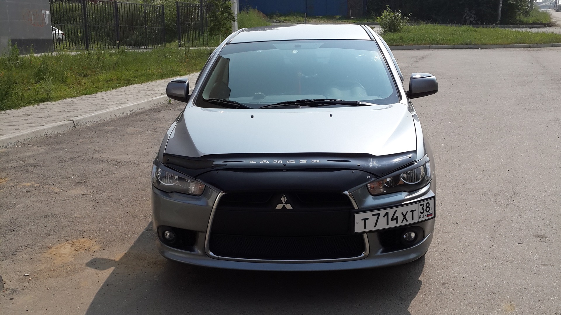 Дефлектор капота лансер. Дефлектор капота Mitsubishi Lancer 10. Дефлектор капота Лансер 10 короткий. Дефлектор капота Мицубиси Лансер 10. Мухобойка Лансер 10.