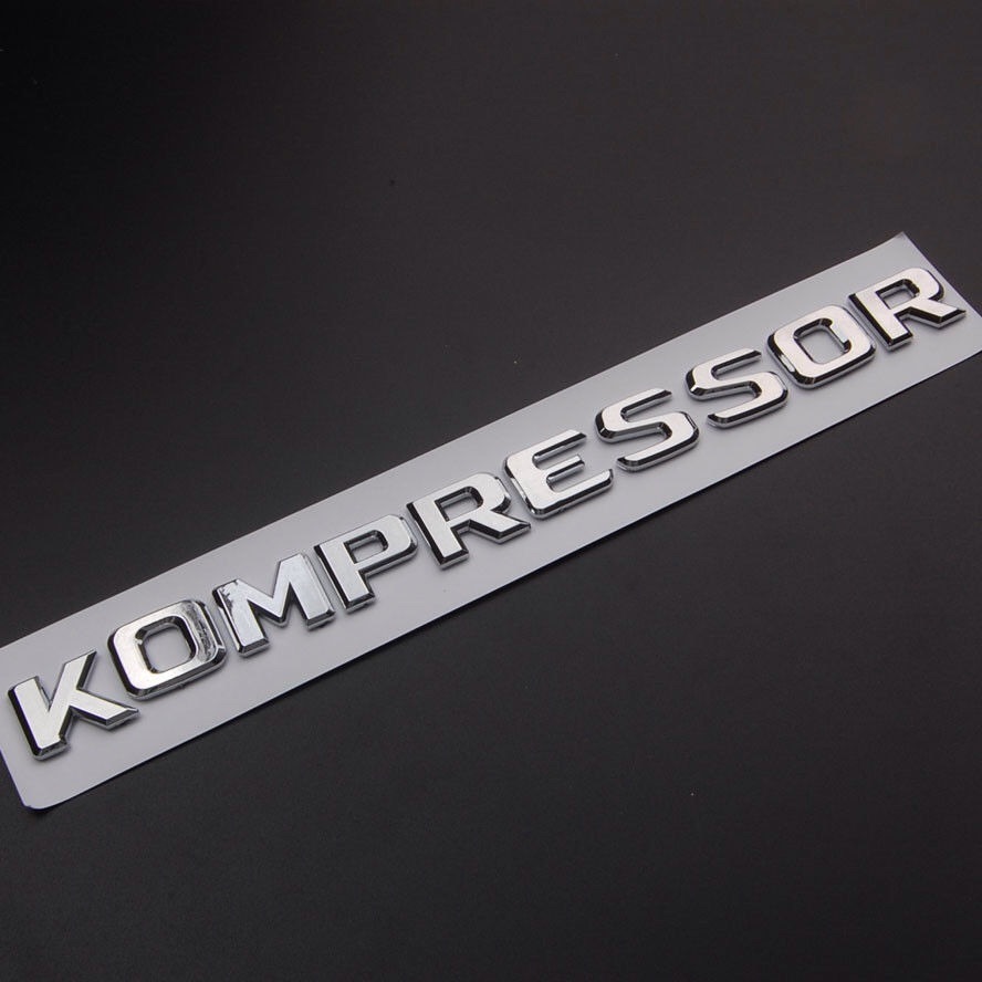 Шильдик буквы. Шильдик Kompressor. Шильдик компрессор Мерседес. V8 Kompressor шильдик. Наклейка Kompressor.