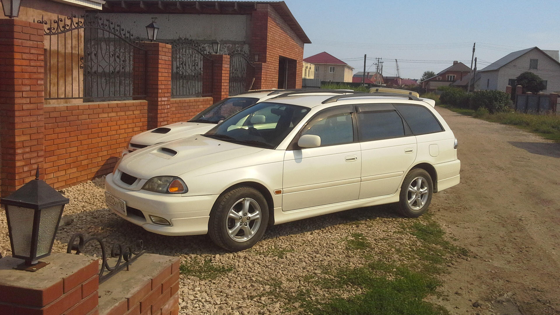 Тойота калдина благовещенск. Toyota Caldina белая. Калдина 210 турбо. Калдина 210 белая. Toyota Caldina Turbo.