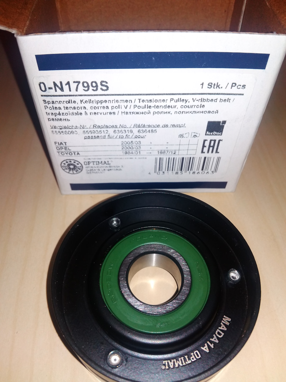 Ролик Optimal 0N-1799S, подшипник Made in Poland — Opel Astra H. Запчасти на фото: 0N1799S, 0636319, 0636485