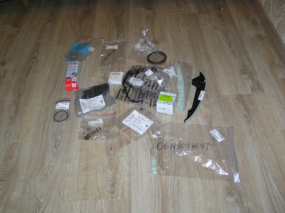 новые детали к замене — Volkswagen Tiguan (1G). Запчасти на фото: 7003463, 1094697