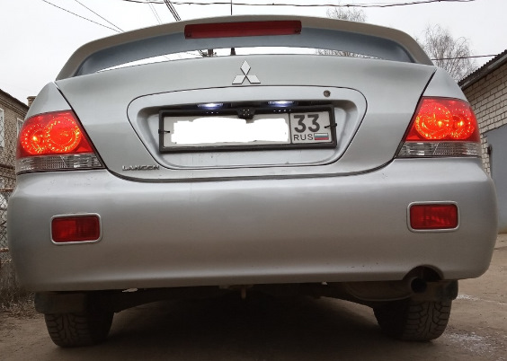 Замена лампочек габаритов и подсветки номера — Mitsubishi Lancer IX, 1 ...
