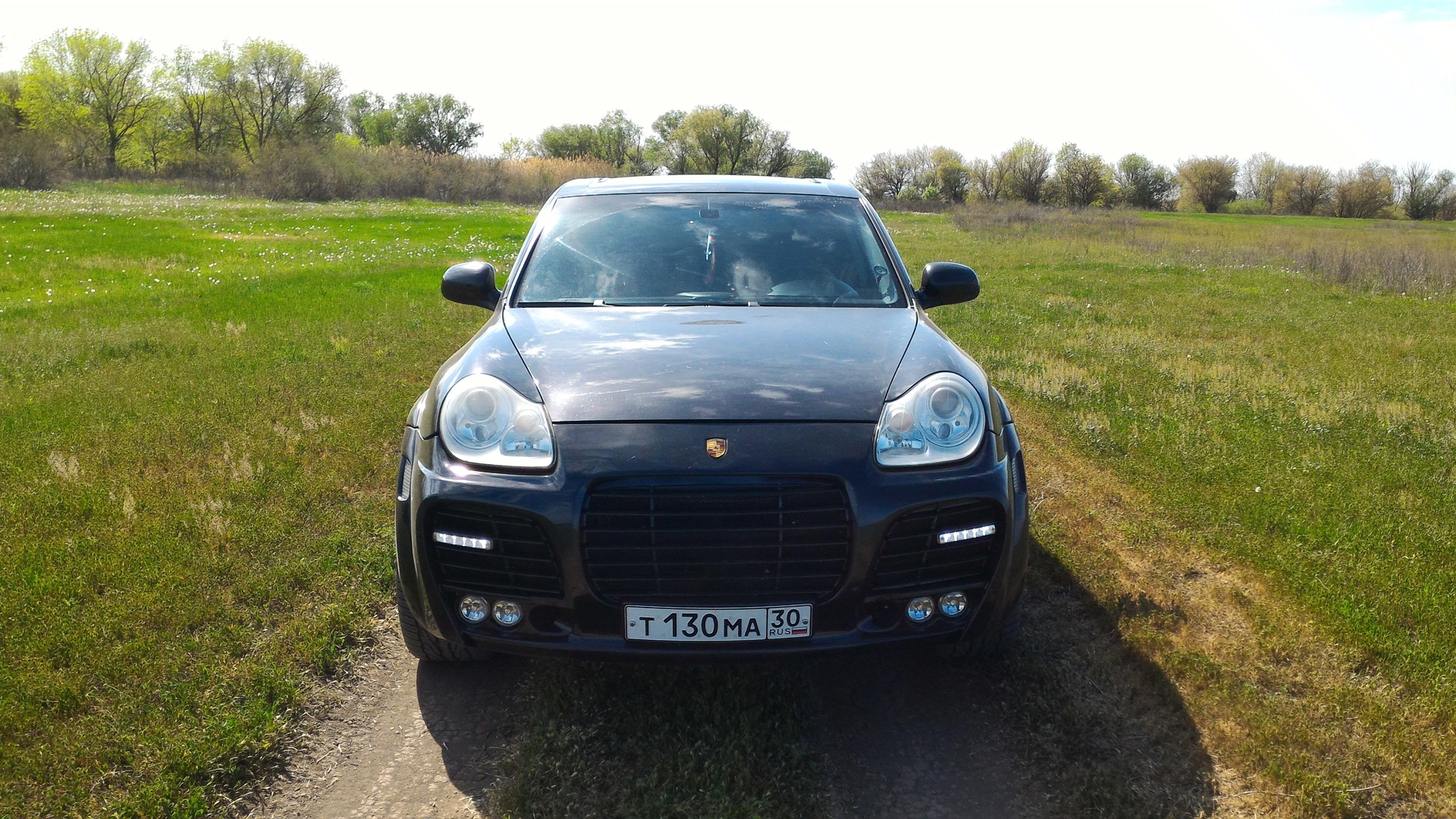 Катушка русь матушка в каене дедушка. Porsche Cayenne 2004 Magnum. Кайен 955 Магнум обои. Каен 2010 черный на даче. Порше в Астрахани.