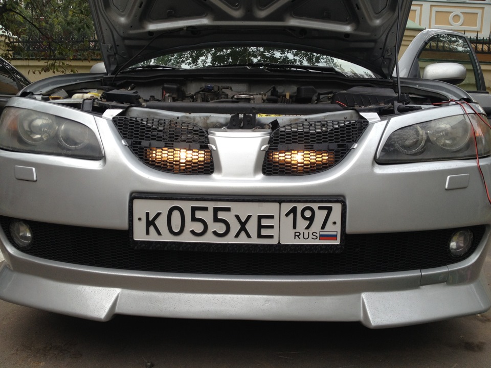 лампа дальнего света тойота ленд крузер 100. птф под решетку радиатора 31105. доп свет под решетку 2106. птф за решетку sg5. Chrysler concorde 2 решетка радиатора.