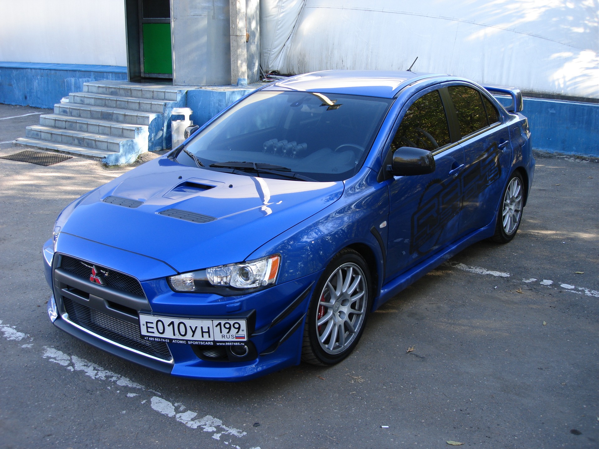 Синий 10. Лансер 10 синий. Mitsubishi Lancer 10 синий в обвесе. Mitsubishi Lancer 10 голубой. Митсубиши Лансер 10 синий.