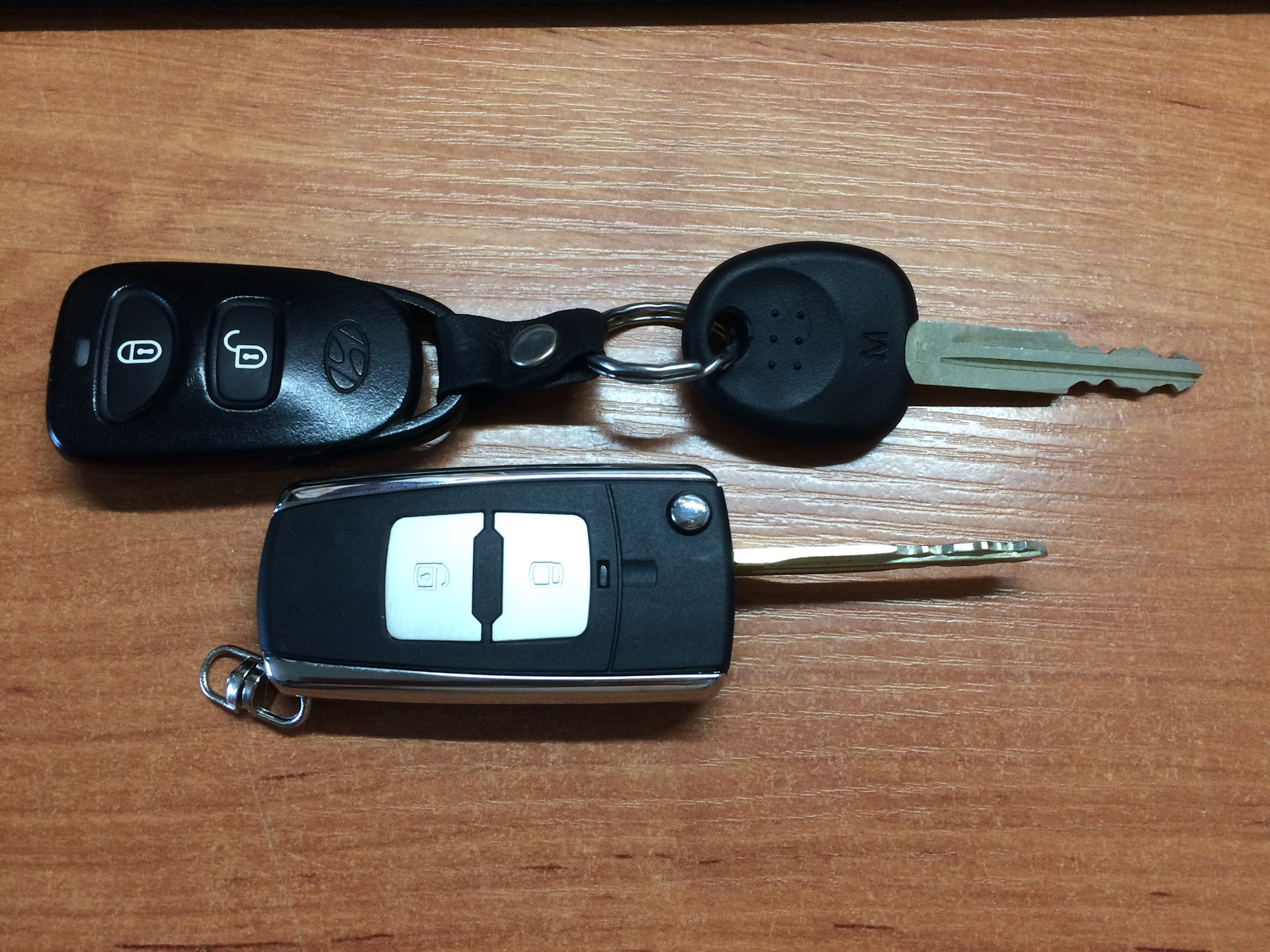 Ключ хендай туссан. Ключ зажигания Туксон 2008. Ключ от Hyundai Tucson 2008. Выкидной ключ Туксон. Ключ Хендай Туссан 2008.