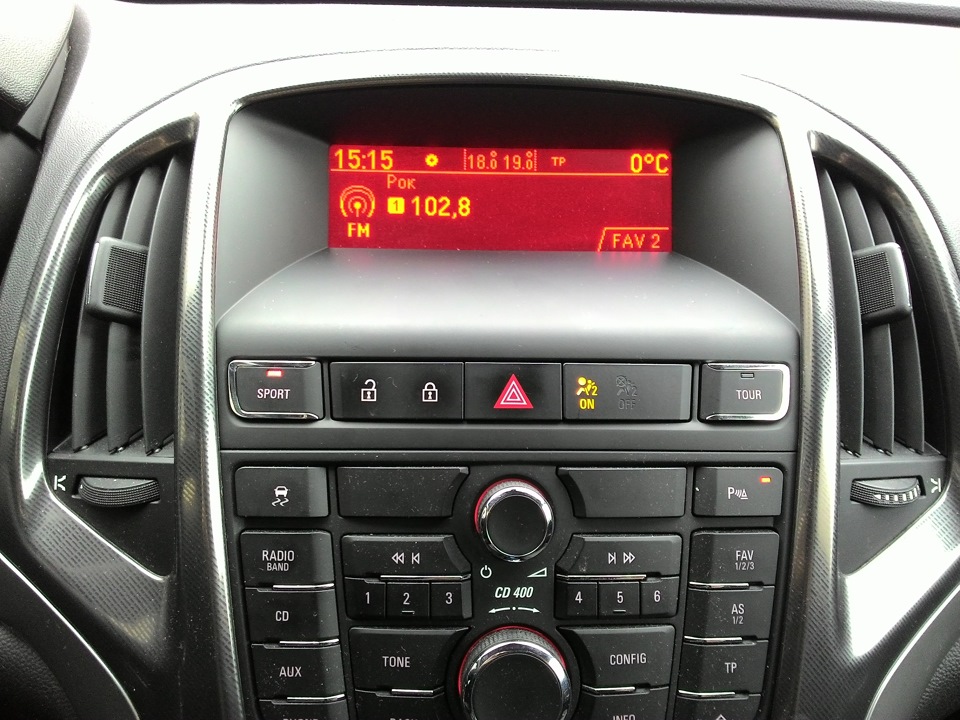 Opel astra h кнопки. Opel Astra j кнопки на панели.
