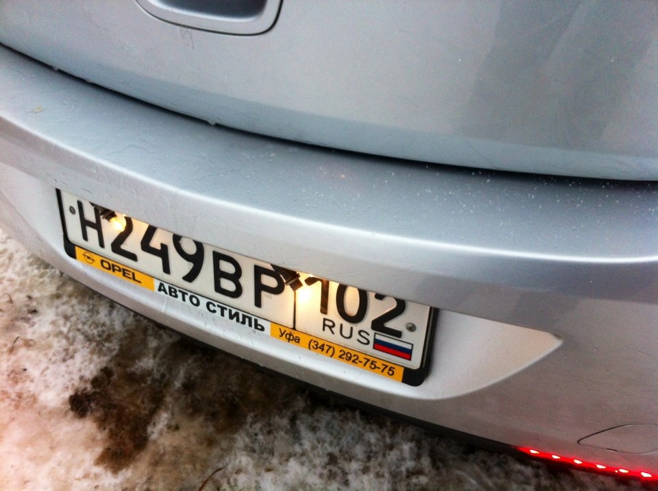 Освещение номерного знака — Opel Astra J, 1,6 л, 2011 года | стайлинг ...