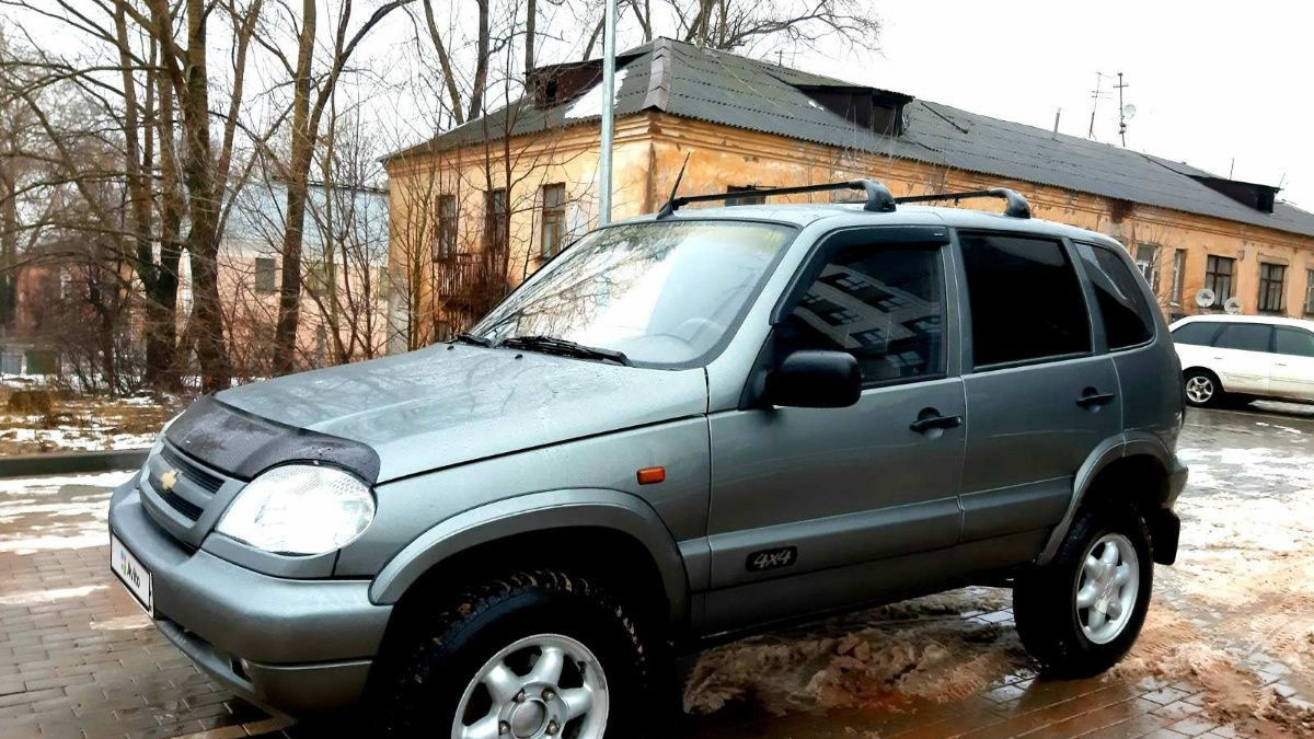 Дром шеви. Шеви Нива Фам 1. Шеви Нива 2004. Chevrolet Niva Drive. Шеви Нива в рапторе.