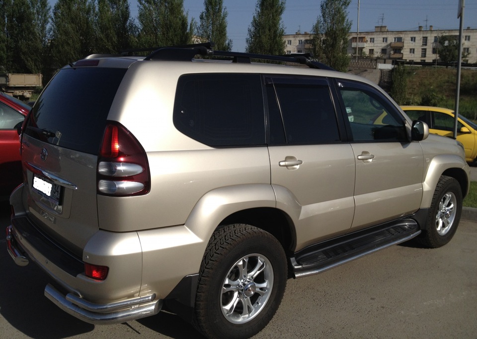 Тюнинг прадо 120. Toyota Land Cruiser 120 золотистый. Land Cruiser Prado 120 Tuning. Prado 120 золотой. Прадо 120 в пленке.